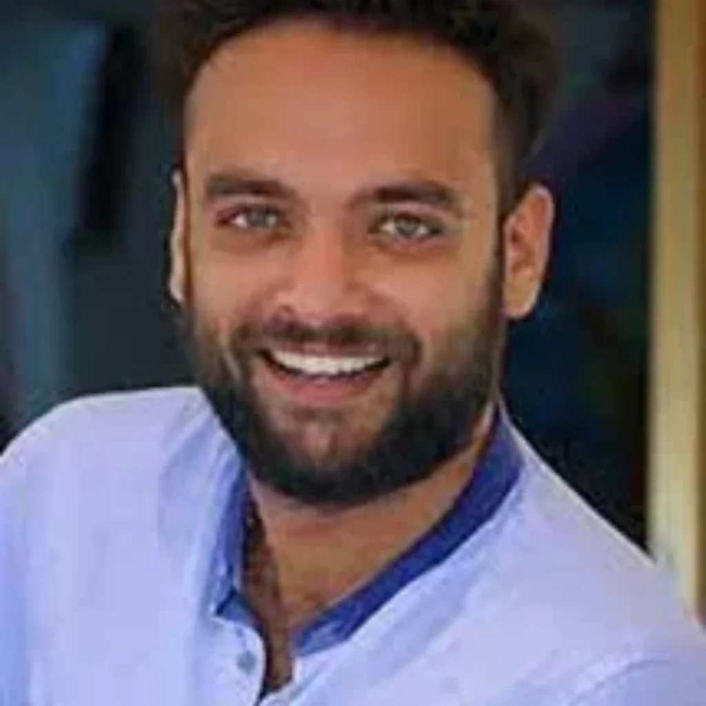 Austin Dan as Rajesh